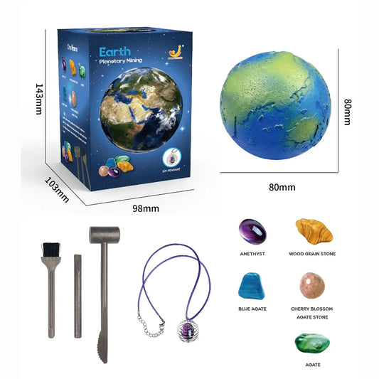 Box featuring Earth planet design, toy digging tools, colorful gems, and a necklace with a gem pendant.