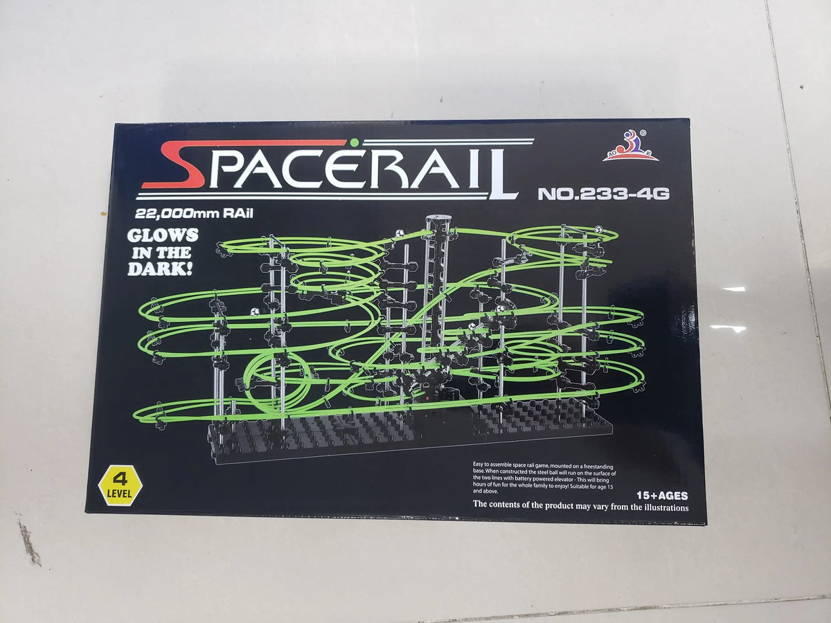 Luminous marble run maze with green tracks and black base, labeled Spacerail No. 233-4, suitable for kids.