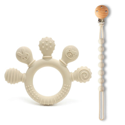 Beige silicone baby teether with textured surfaces and a wooden bead soother attached by a string.
