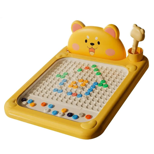 Yellow bear-themed magnetic drawing board with scattered colorful magnetic dots