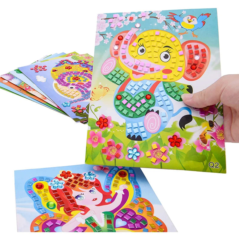 Colorful mosaic stickers featuring an elephant and a fairy, held by a hand, with various designs in the background.