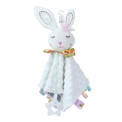 White plush bunny comforter with colorful tags and floral bow, soft texture for infants.