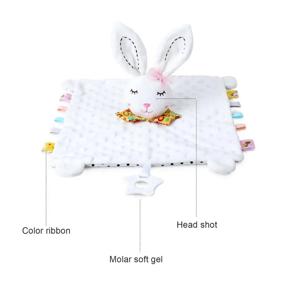 Plush bunny head attached to a soft white blanket with colorful ribbons and a star-shaped teether.