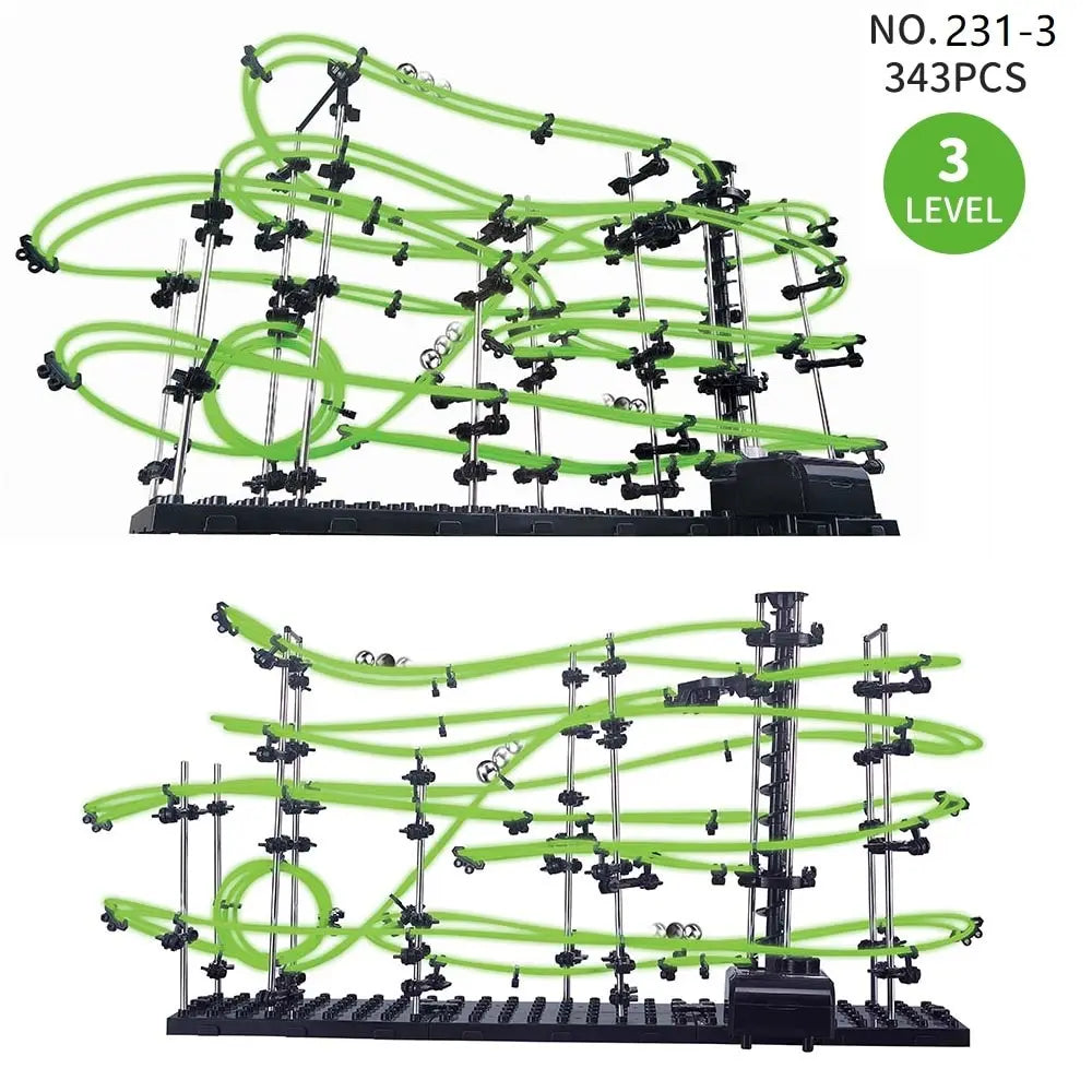 Three-level marble run maze with green tubes and black base, featuring multiple tracks and connectors.