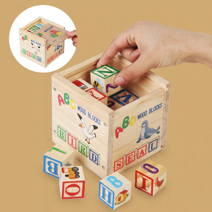 Wooden block toy set with letters and numbers in a storage box, featuring colorful cartoon designs.