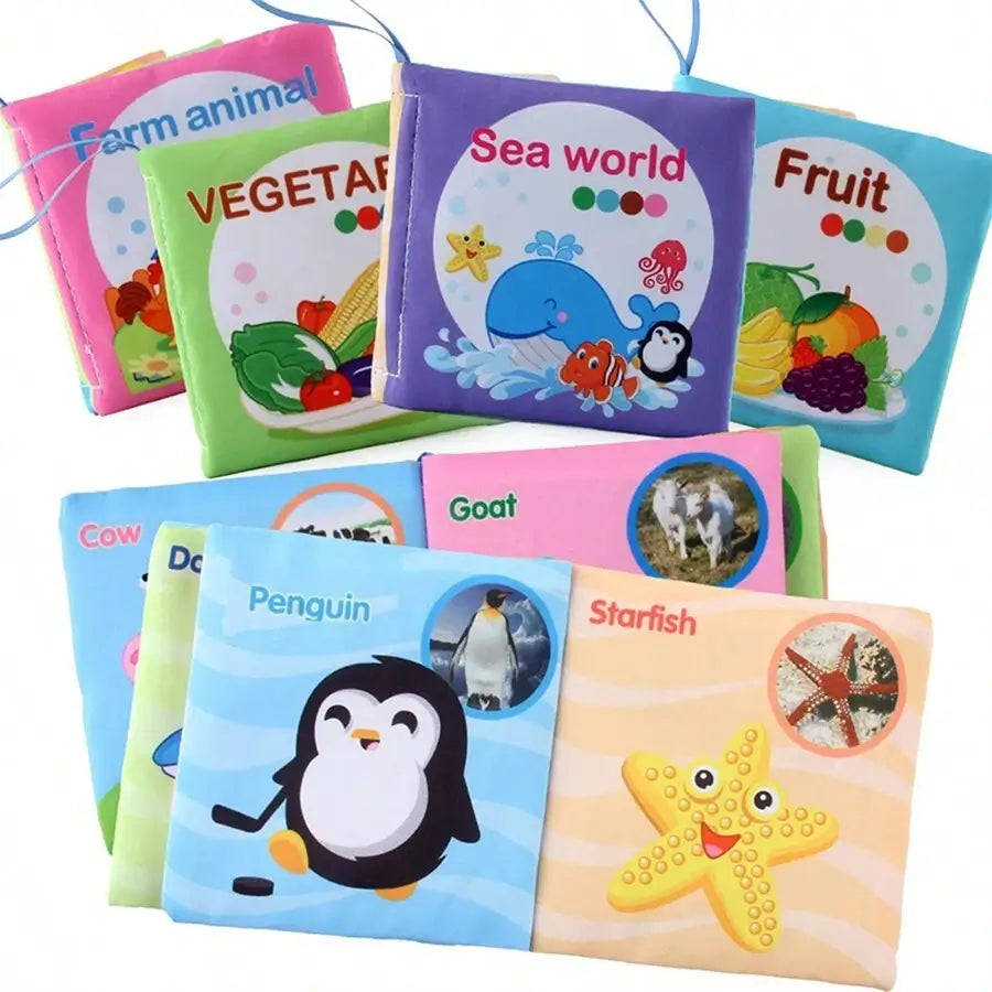 Set of colorful baby cloth books featuring animals and fruits with crinkle textures and teething rings.