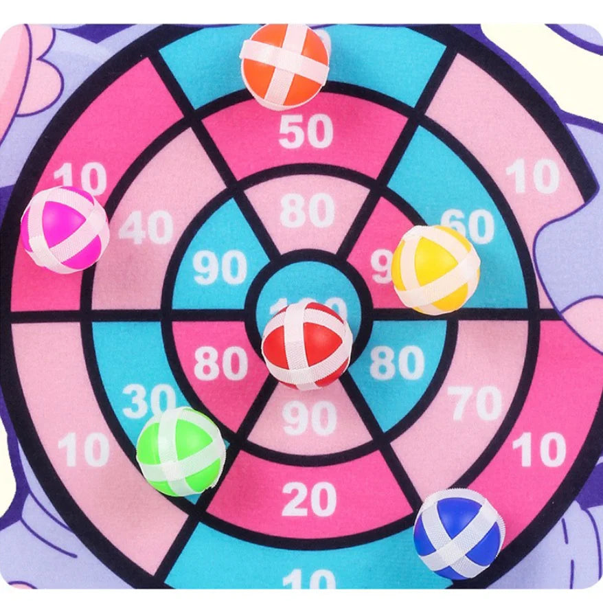 Colorful sticky balls on a cartoon animal dart board with numbered sections, designed for kids' interactive play.
