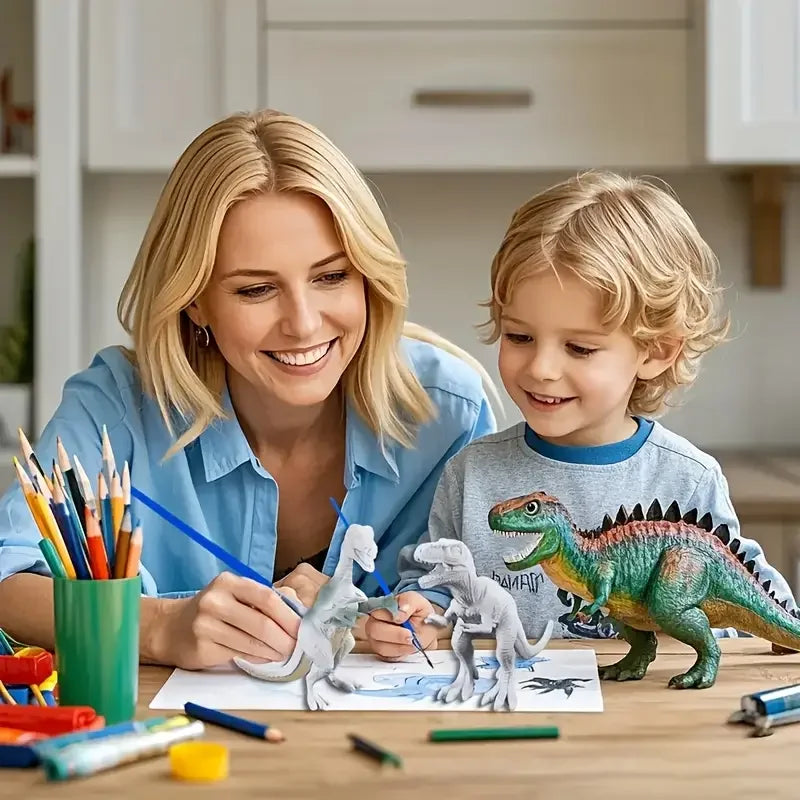 A woman and a boy painting unpainted dinosaur models with colorful pencils and art supplies on a table.