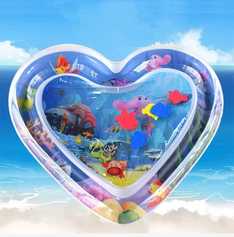 Heart-shaped inflatable water play mat with colorful sea creatures and underwater scene, suitable for infants.