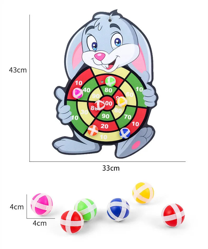 Cartoon rabbit holding a colorful dart board with sticky balls in red, green, blue, and white.