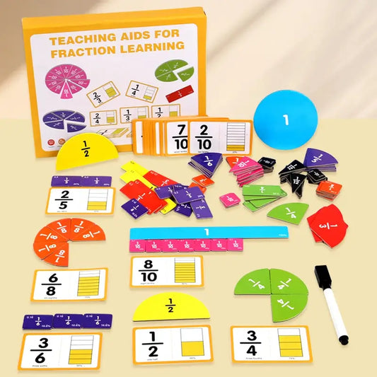 Wooden math fraction learning set with colorful cards, plates, and a marker, arranged on a light surface.