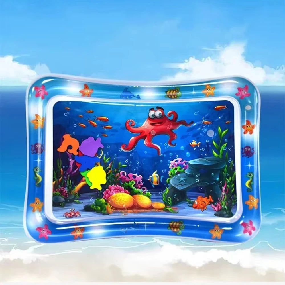 Inflatable baby water play mat featuring colorful underwater scene with an octopus and fish, surrounded by sea plants.