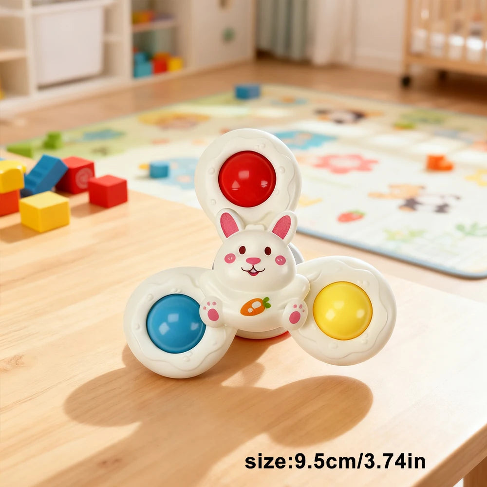 White rabbit-shaped toy with colorful buttons in red, blue, and yellow, designed for baby bath time.