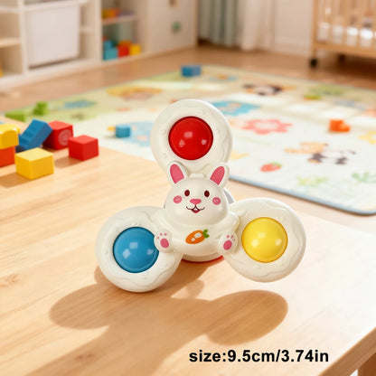 White rabbit-shaped toy with colorful buttons in red, blue, and yellow, designed for baby bath time.