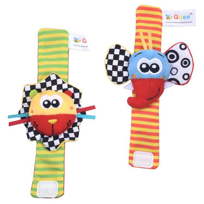 Two colorful baby wrist rattles featuring animal designs, one with a lion and the other with a butterfly, soft fabric.