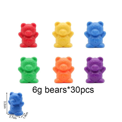 Colorful plastic counting bears in red, yellow, green, blue, and purple, each marked with '6', arranged in a row.