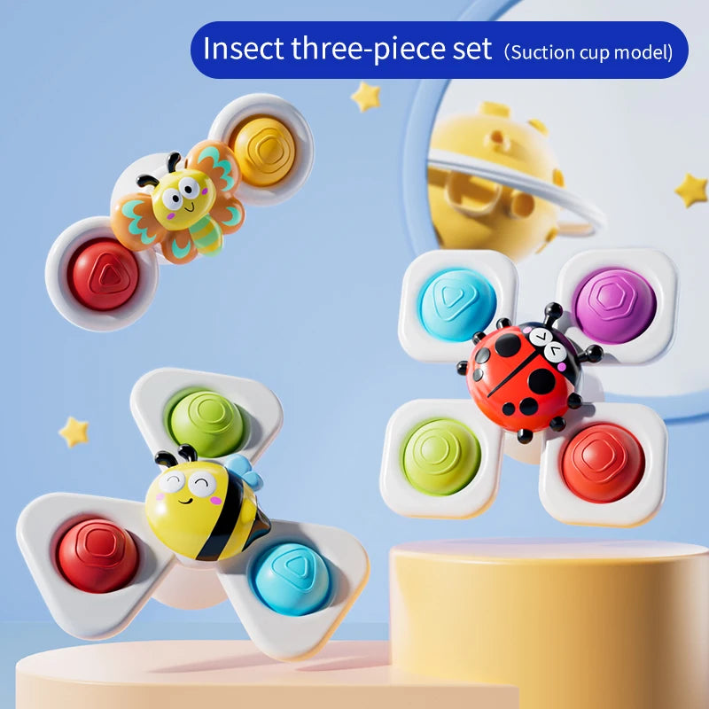 Three-piece suction cup spinning top toy set featuring colorful insect designs including a bee and ladybug.