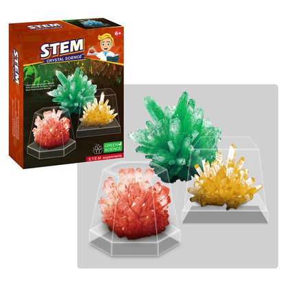 Three colorful crystal formations in red, green, and orange with a box labeled STEM Crystal Science.