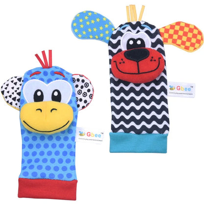 Two colorful baby socks designed as animal faces, featuring a blue monkey and a black dog with playful patterns.