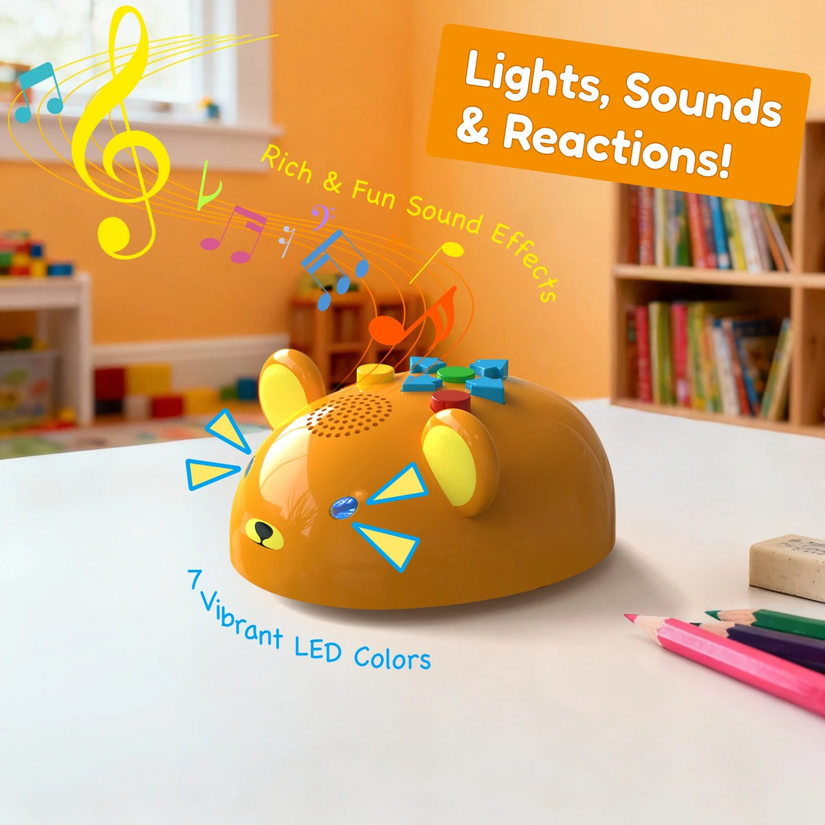 Yellow coding robot bear with LED lights and sound buttons, colorful background with pencils and toys.