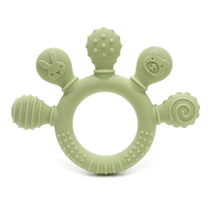 Light green silicone baby teether with various textured shapes including a bunny, bear, and spiral design.