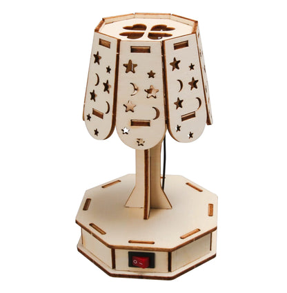 Wooden lamp with star and moon cutouts, featuring a base with a power switch, designed for DIY assembly.
