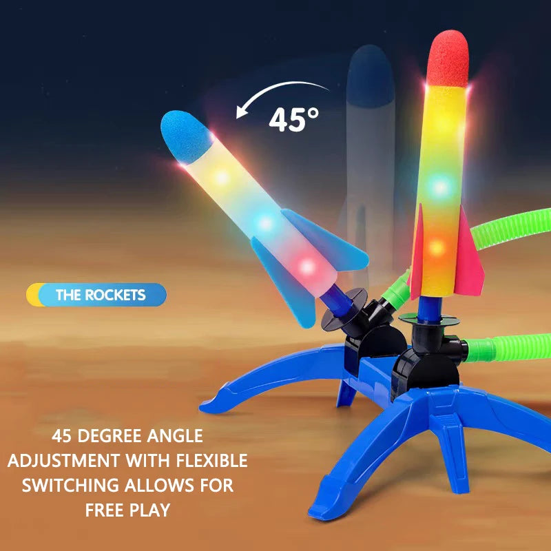 Colorful rocket launcher with three rockets, adjustable angle, and stomp pad for outdoor play. Bright lights on rockets.