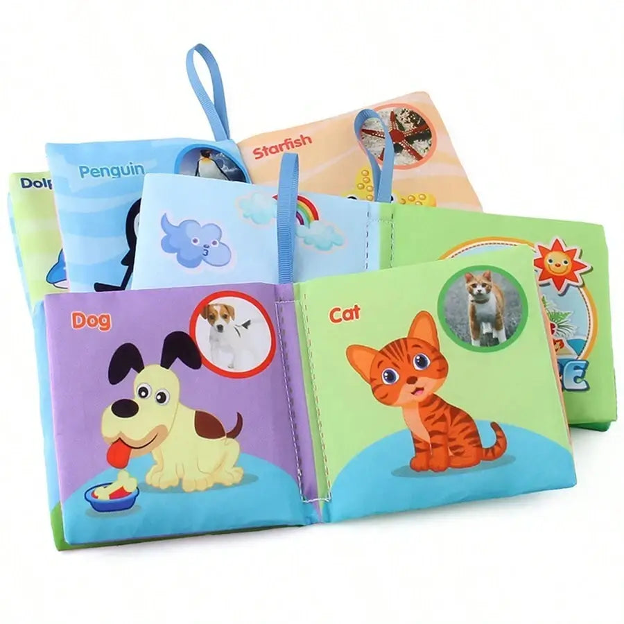Colorful washable baby cloth book set featuring animals like a dog, cat, penguin, and starfish with textured pages.