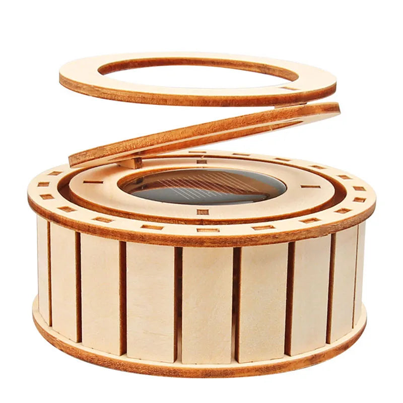 Wooden solar ring kit with a circular base and removable top, featuring slotted sides for assembly.