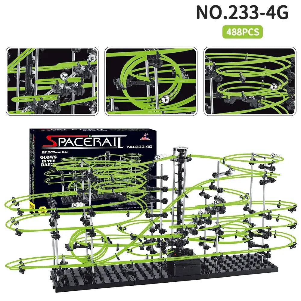 Luminous marble run maze with green tracks, black supports, and electric elevator, featuring multiple levels and designs.