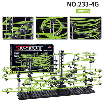Luminous marble run maze with green tracks, black supports, and electric elevator, featuring multiple levels and designs.