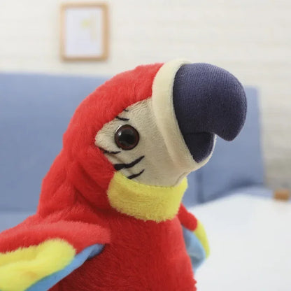 Colorful stuffed macaw parrot plush toy with a red body, yellow accents, and blue wings, sitting on a soft surface.