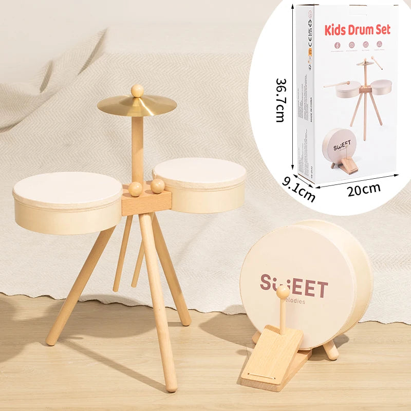 Wooden kids drum set with two white drums, a cymbal, and a pedal, featuring a natural wood finish.