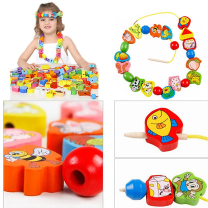 Colorful wooden beads in various shapes and designs, including fruits and animals, with a threading tool.