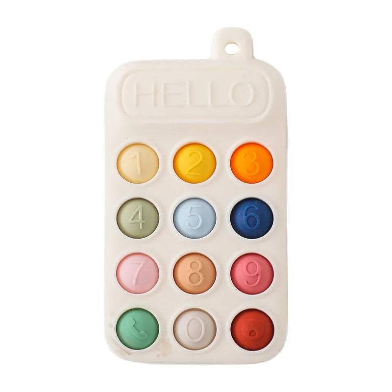Silicone baby teether toy shaped like a cell phone with colorful buttons and the word 'HELLO' on top