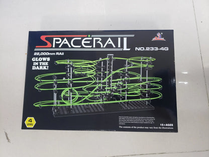 Luminous marble run maze with green tracks and black base, labeled Spacerail No. 233-4, suitable for kids.