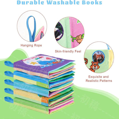 Stack of colorful washable baby cloth books with hanging ropes and various textures, featuring animal patterns.