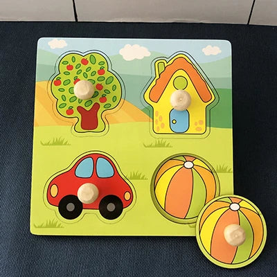 Wooden puzzle board with tree, house, car, and ball shapes, featuring colorful illustrations and knobs for easy handling.