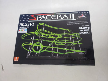 Box of Spacerail marble run maze with green tracks, labeled Level 3, glowing in the dark, educational toy for kids.