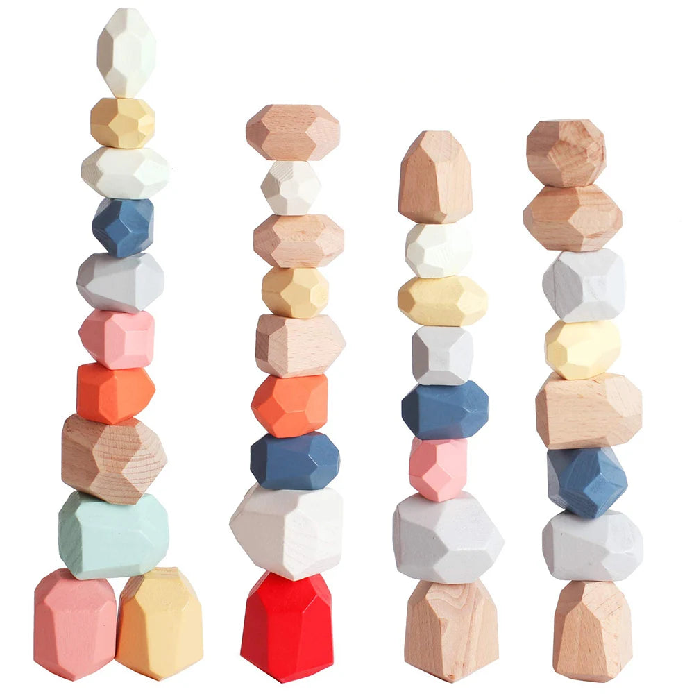 Colorful wooden stacking stones in various shapes and sizes, arranged in four vertical towers, ideal for sensory play.