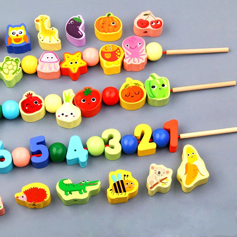 Colorful wooden beads in various shapes including animals and fruits, with threading sticks for kids' play.