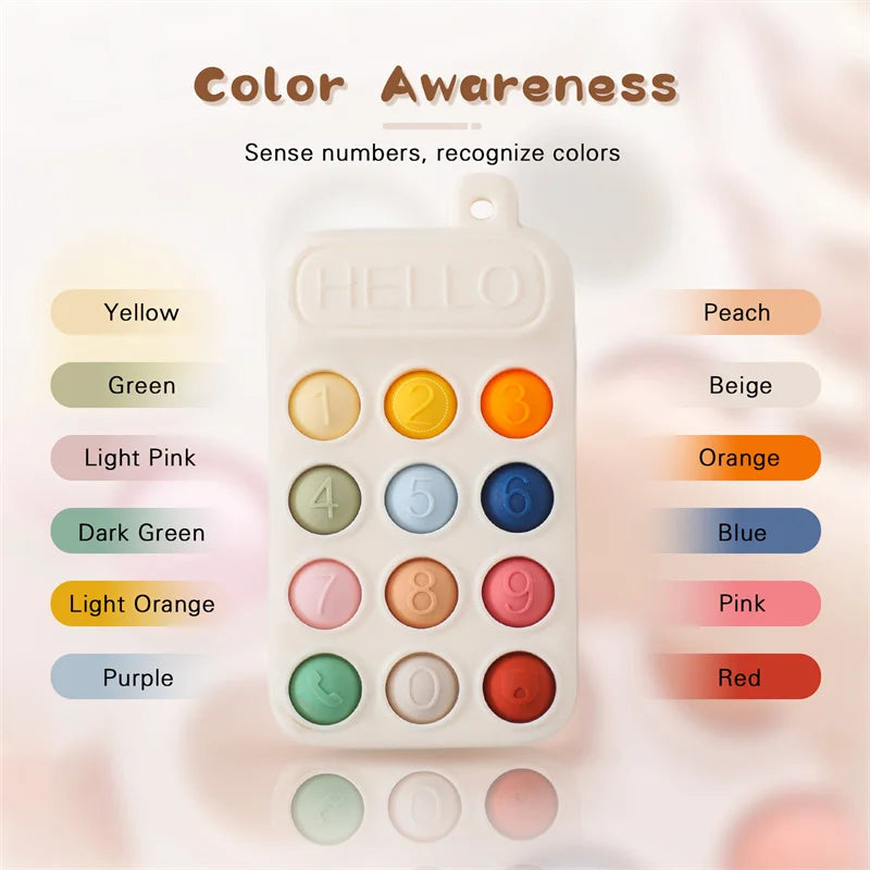 Silicone baby teether toy shaped like a cell phone with colorful buttons and text 'HELLO' for color and number recognition