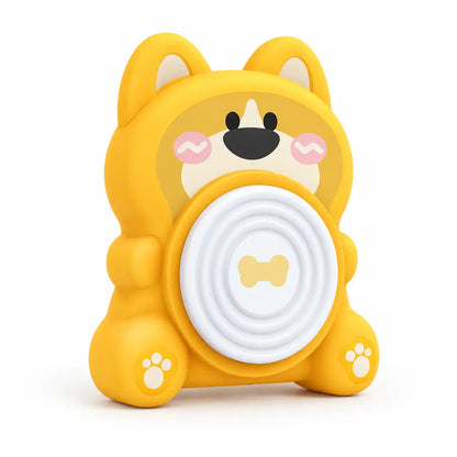 Yellow pottery wheel shaped like a cartoon dog, featuring a white circular center and paw prints on the base.