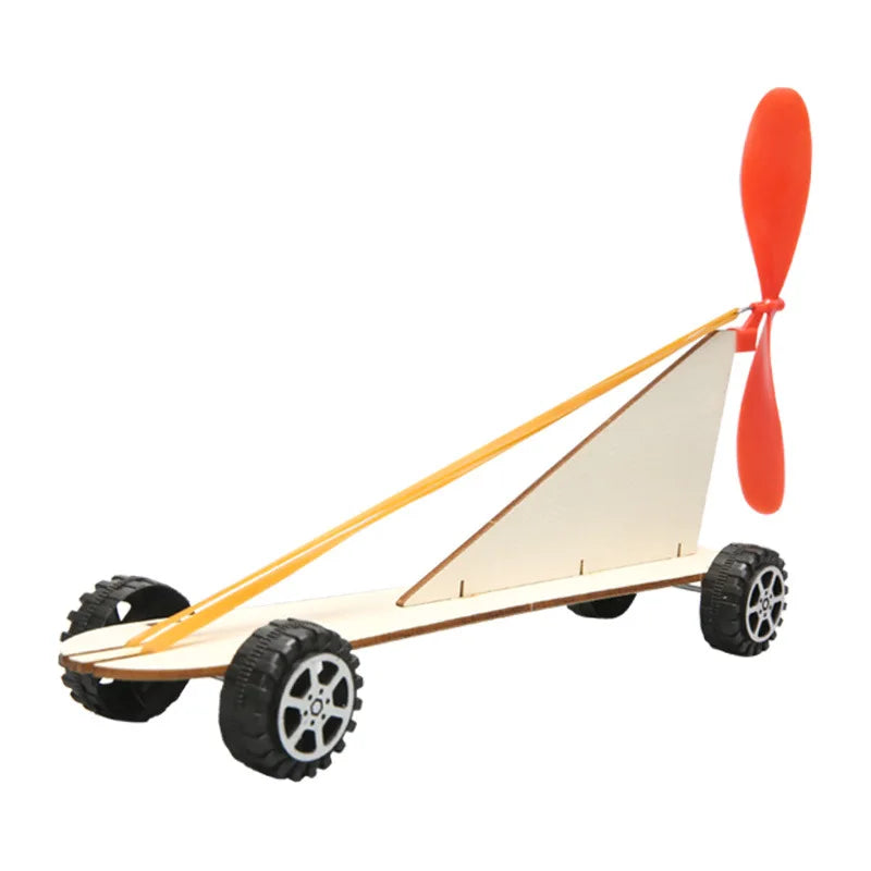Elastic car toy with wooden body, rubber wheels, and a red propeller, designed for kids' STEM projects.