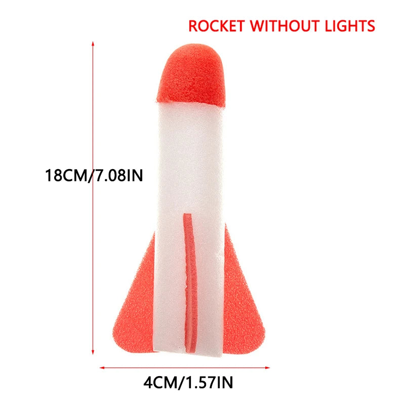 Red and white foam rocket with a pointed top and fins, measuring 18 cm tall and 4 cm wide.