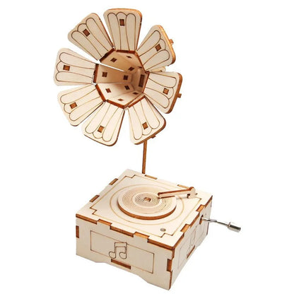 Wooden gramophone model with a flower-shaped horn and square base, featuring intricate cut-out designs.