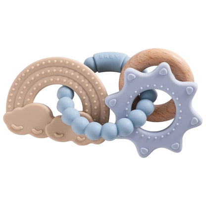 Silicone teether set featuring a rainbow, clouds, and a star shape in soft pastel colors with wooden accents.