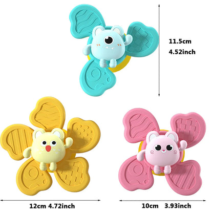 Colorful baby bath toys featuring cartoon animal designs with suction cups, yellow, pink, and blue colors.