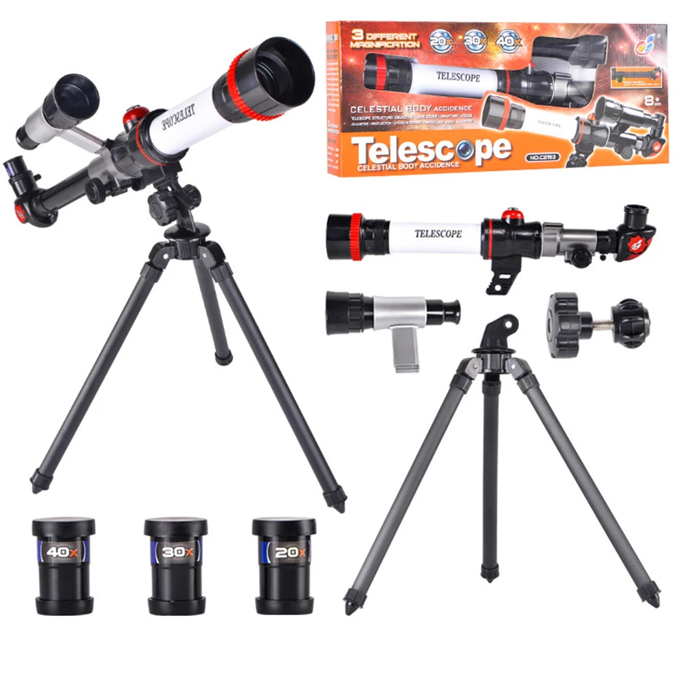Astronomical telescope with red accents, three eyepieces, and a tripod, packaged with accessories for kids.