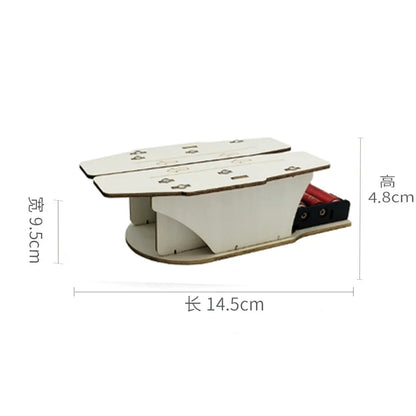 Wooden paper airplane catapult with a white base and red launch mechanism, designed for kids' STEM education.